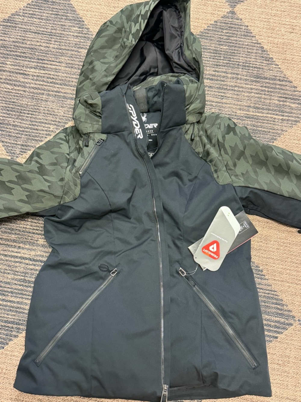 Spyder Black Jacket with Green Houndstooth Hood and Sleeves